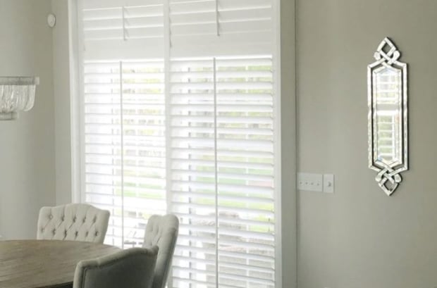 Plantation shutters in a dining room